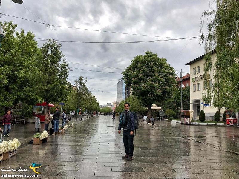 Walking to Pristina bus terminal on a rainy Sunday